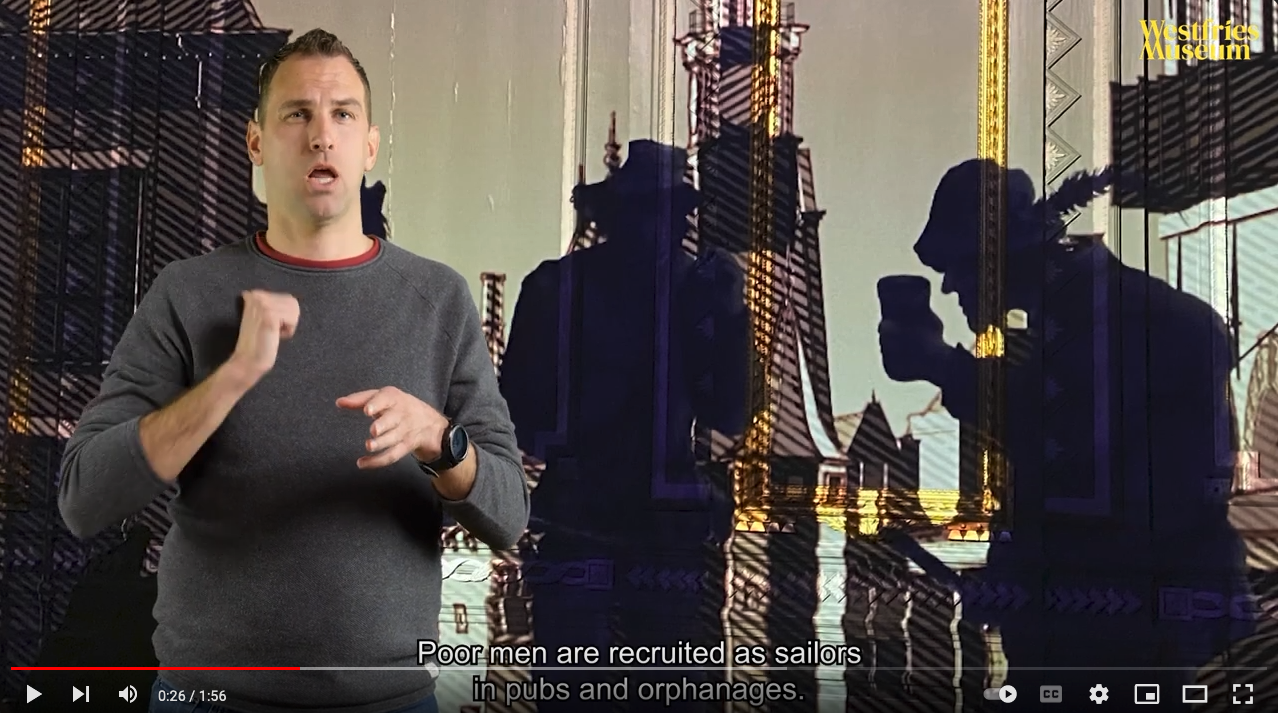 persoon beschrijft geprojecteerd beeld in gebarentaal